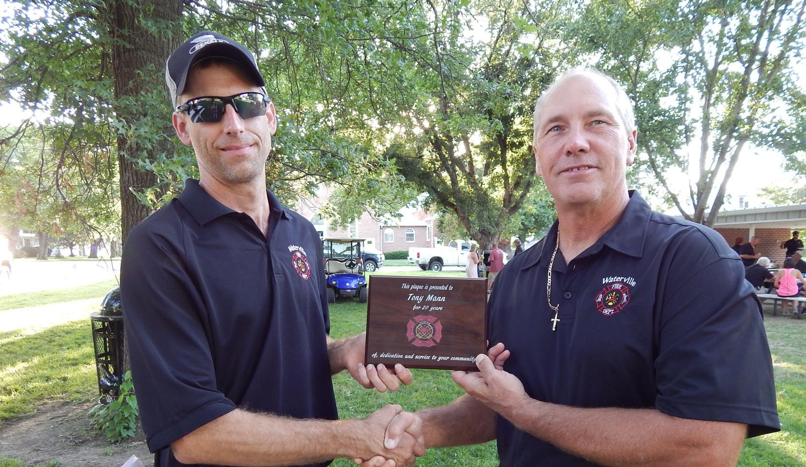 Hargrave, Mann honored for 20 years with fire department